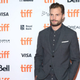 Illustration for article titled Jamie Dornan blames Kristen Wiig for roping him into Gal Gadot’s “Imagine” singalong